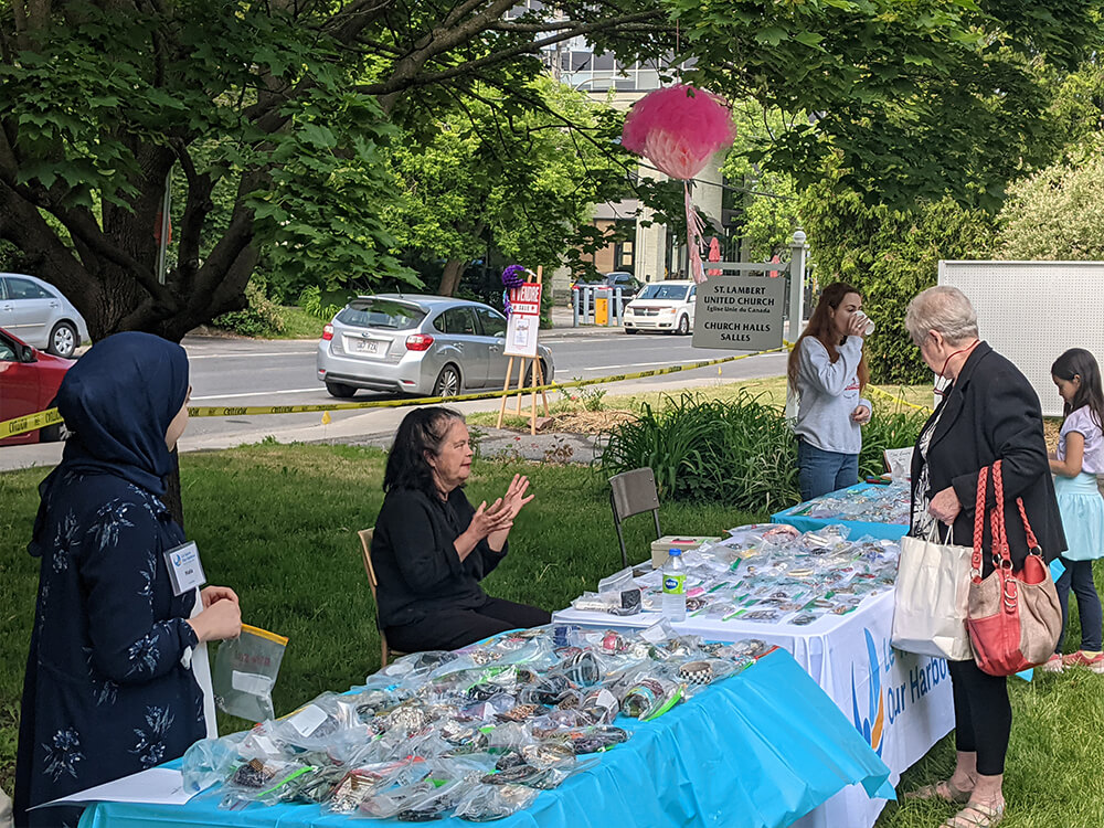 Our Harbour merchandise for sale at our 2023 art exhibit