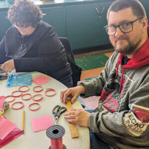 Our residents making art work at the Our Harbour club house